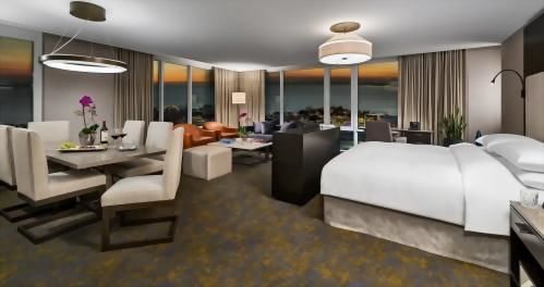 Do it big! Our Royal Junior Suite offers a 1 King Bed, a living area, a dining area & exhilarating sunset views.