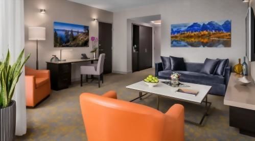 Traveling for business? Our One Bedroom Suite living area features a well-appointed office space.