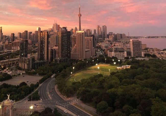Image of the Toronto city skyline at sunset, as viewed from Hotel X Toronto.