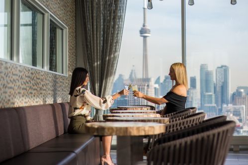 Enjoy cocktails with an iconic view of Toronto's CN Tower!
